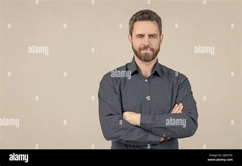 Confident Man Wear Casual Shirt Keeping Arms Crossed Grey Background