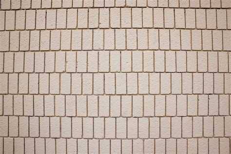 Tan Brick Wall Texture With Vertical Bricks Picture Free Photograph