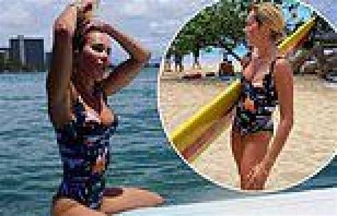 Pip Edwards Shows Off Her Gym Honed Physique While Surfing In Honolulu Hawaii