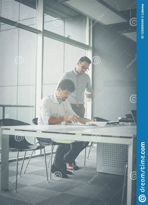 Two Business Men Working Together In Office Stock Image Image Of