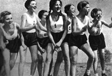 An Old Black And White Photo Of Women In Bathing Suits