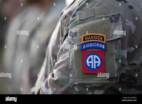 A Us Army Paratrooper Assigned To The 82nd Airborne Division Stands