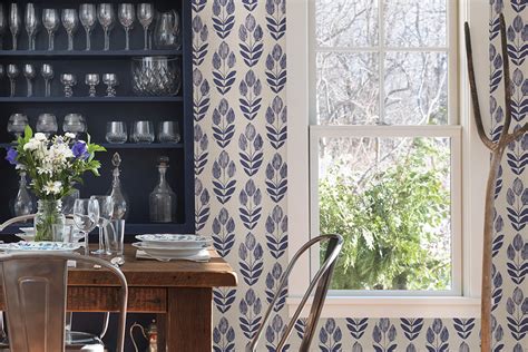 A pool house kitchen designed by sarah wittenbraker features toile wallpaper, glossy blue cabinetry, and cement tile. Fix Up Your Kitchen with Wallpaper When Remodeling Has to Wait