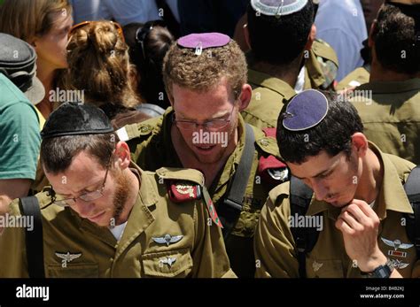 Israeli Soldiers Praying In A Military Graveyard On Fallen Soldiers