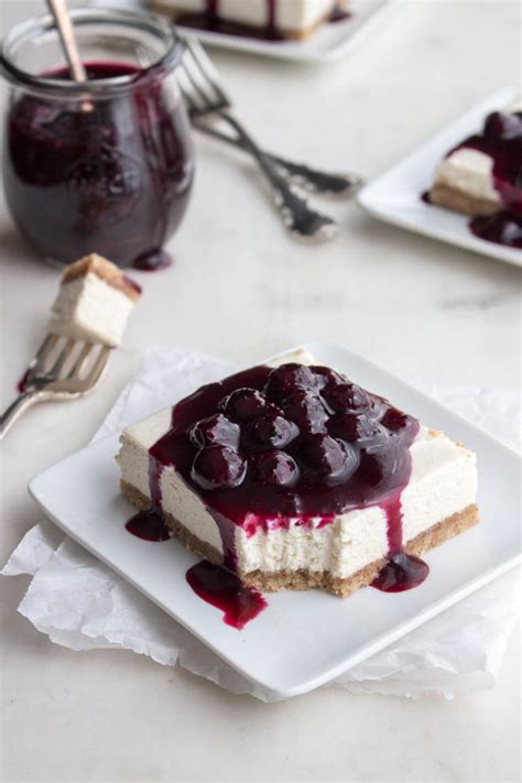 No matter the question, cheesecake bars are always the answer. No-bake Cheesecake Bars (Blueberry Sauce) | Low Carb Maven