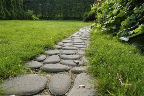 Path From Cobble Stones In A Grass In A Garden Stock Photo Image Of