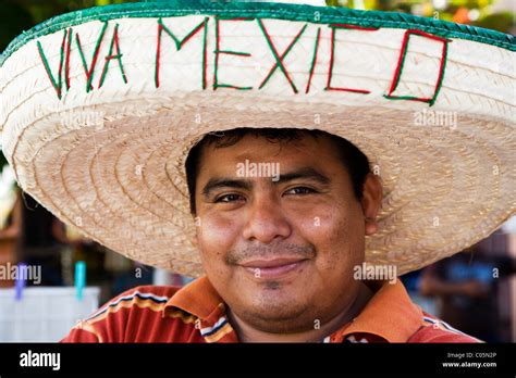 Portrait Of Mexican Man From Yucatan Wearing A Sombrero With Viva