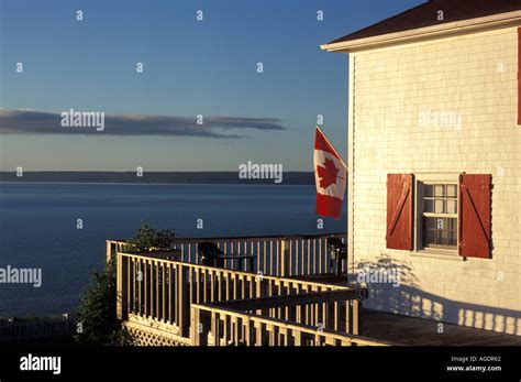 Cape Enrage Lighthouse With Lighthouse Keepers House On A Clear Day At