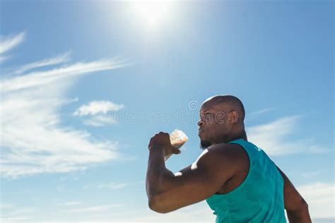 Athlete Drinking Health Drink During Workout Outdoors Stock Photo