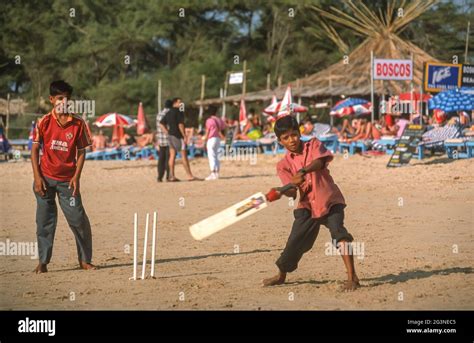 Baga Beach Goa India Boys Play Cricket On Beach Stock Photo Alamy