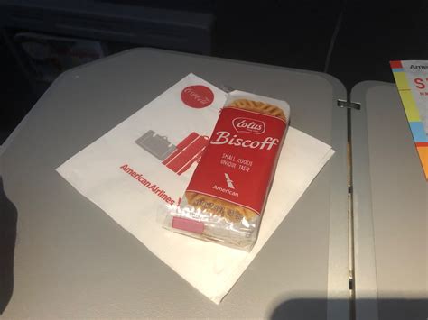 Complimentary snacks and alcoholic beverages. American Airlines Main Cabin Extra 737-800 Review ...