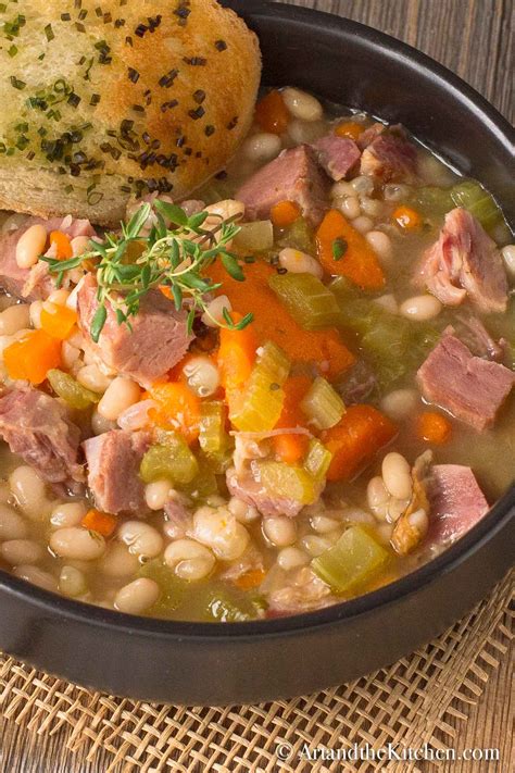 Add chicken stock, water, diced ham, ham shank, oregano, bay leaf and 2 cans of beans. Ham and Bean Soup | Art and the Kitchen