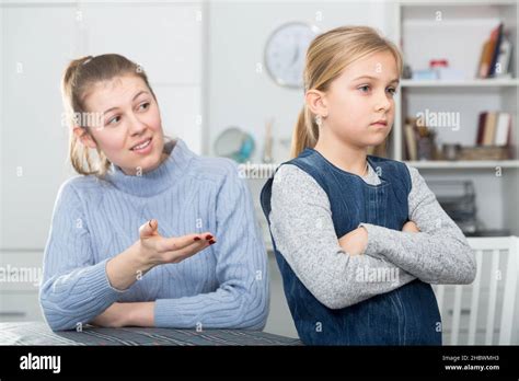 Mother Soothes Little Daughter After An Quarrel Stock Photo Alamy