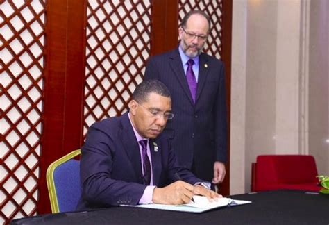 caricom chairman signs agreements cnw network