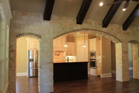 Stone Archway Into Kitchen Traditional Kitchen Dallas By