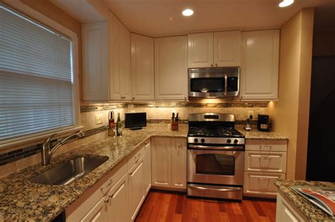 These kitchen refreshes are seriously inspiring. Kitchen Remodel, white cabinets, tile backsplash ...