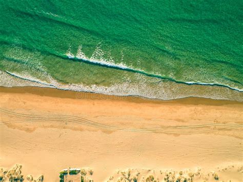 Aerial View Amazing Seascape With Small Waves On Sandy Beach Stock
