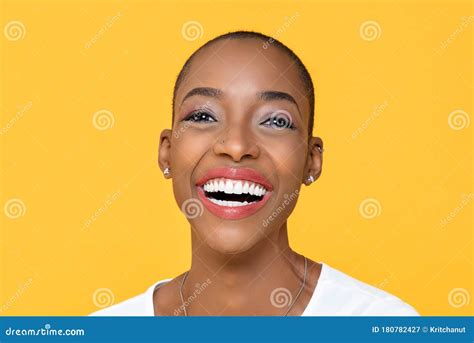 Close Up Portrait Of Friendly Happy African American Woman Smiling