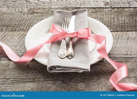 Elegance Table Setting With Pink Ribbon On Wooden Board Rustic Stile