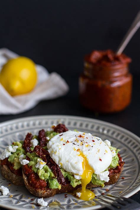 Harissa Smashed Avocado And Egg Toast With Goat Cheese