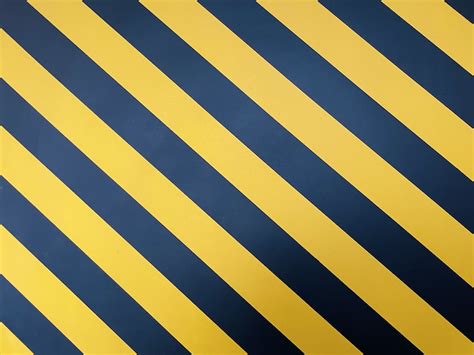A Black And Yellow Striped Wallpaper With Vertical Stripes Photo Free