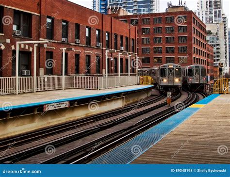 Two Of Chicago S Elevated El Trains Approaching And Leaving The
