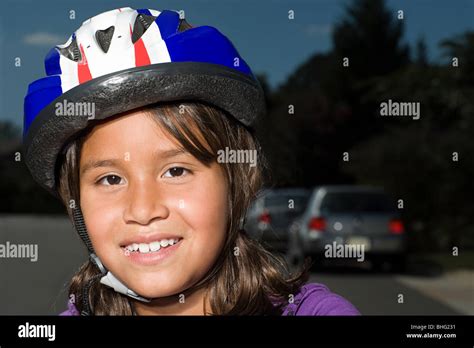 Girl Wearing Bicycle Helmet Stock Photo Alamy