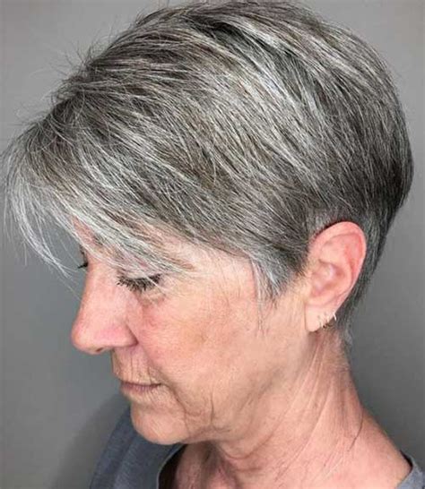 Pair a deep side part with bangs. 2019 Short Haircuts for Older Women