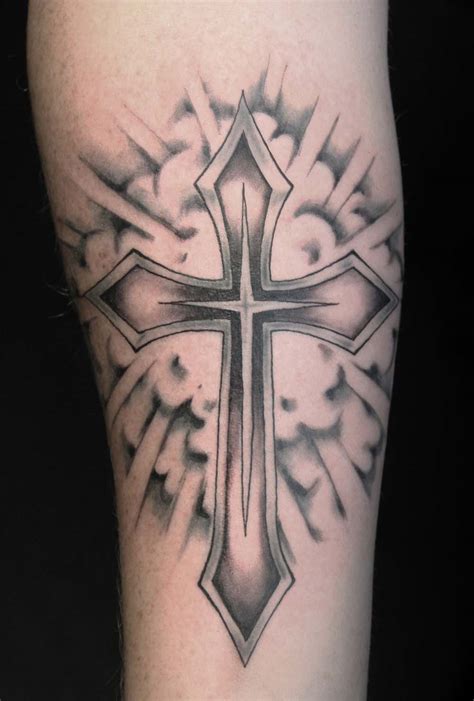 The symbol was used in ireland and scotland to represent heritage and faith. TATTOOinc-Black and Grey Tattoo Gallery
