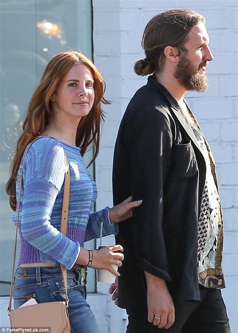 Lana Del Rey Cosies Up To A Bearded Mystery Man As They Step Out In Beverly Hills Daily Mail