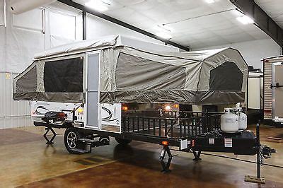 • 47 x 82 door assembly • bed door, tent, and pole kits • features the secure lock fastening system. rvs: New 2016 BR23SC Pop Up Toy Hauler Slide Out Folding ...