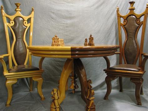 When you tire of cards and want to play chess, simply spin the center section of this table toreveal a gorgeous, checkered game board. Chess Table, Chairs, & Chess Set