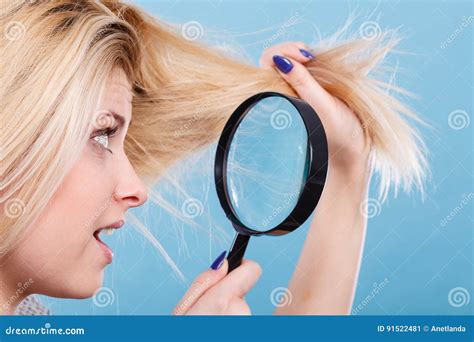 Woman Looking At Hair Through Magnifying Glass Stock Image Image Of