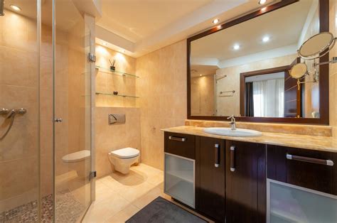 Modern Bathroom Interior With Shower Cabin Against Mirrors · Free Stock