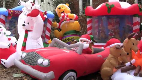 Decorating for christmas is a big business. TONS of Christmas Inflatables at One House - YouTube