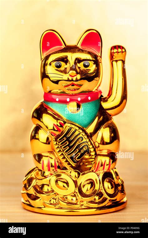A Photo Of Maneki Neko A Japanese Lucky Beckoning Cat Figurine On A