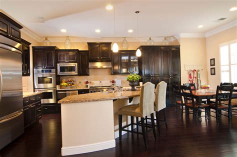 They come in various choices and stains, don't disintegrate or rot, all while offering the beauty of natural wood grain. 34 Kitchens with Dark Wood Floors (Pictures)