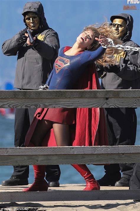 Melissa Benoist As Supergirl Struggles In Chains Surrounded By Armed