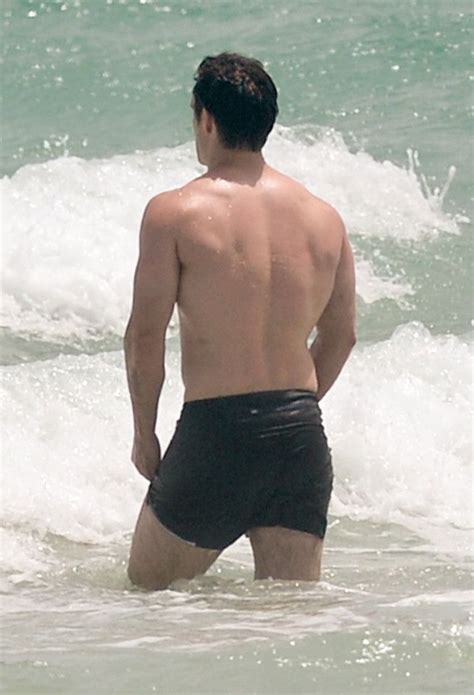 henry cavill shows off his man of steel body while going for a swim on miami beach henry