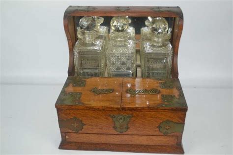 Antique Tantalus Liquor Decanter Set