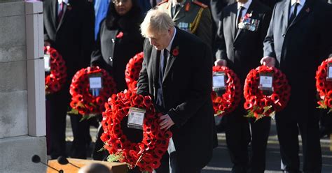 Remembrance Sunday Boris Johnson Pictured Laying Wreath On Cenotaph Upside Down Mirror Online