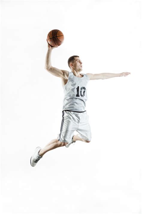 Premium Photo Concentrated Basketball Player Jumping