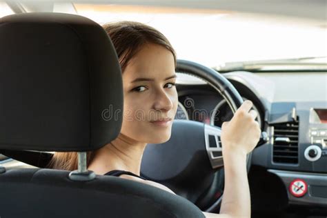 Driving School Student Driver Takes An Exam In A Car To Obtain A