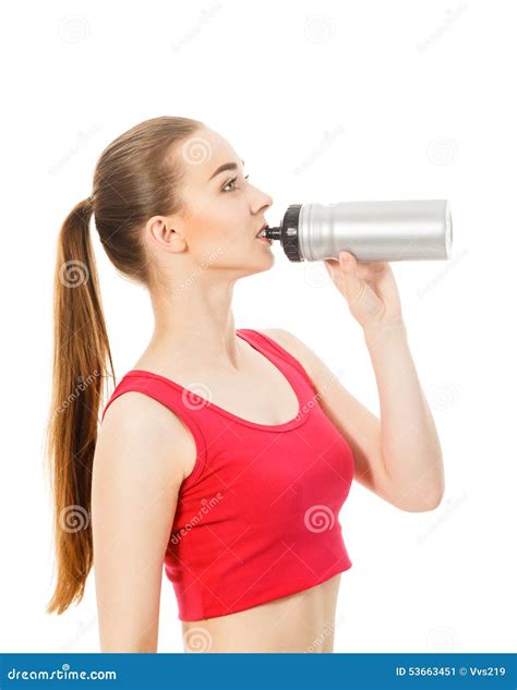 Athletic Girl Drinks Water After Exercising Isolated In White Ba Stock