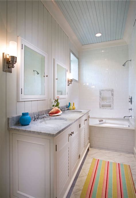 The steam and moisture that baths and showers generate makes life difficult for every surface in the bathroom. Small Cottage with Turquoise Interiors - Home Bunch ...