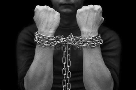 Male Hands With Chain Wrapped Around Them Prisoner Concept Hostage
