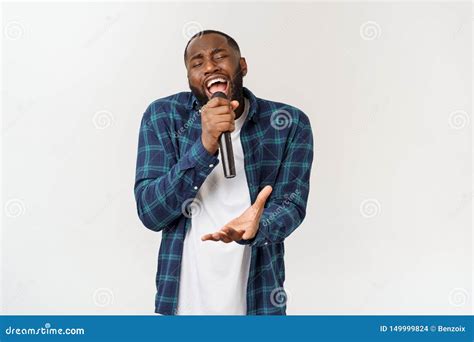 Portrait Of Cheerful Positive Chic Handsome African Man Holding