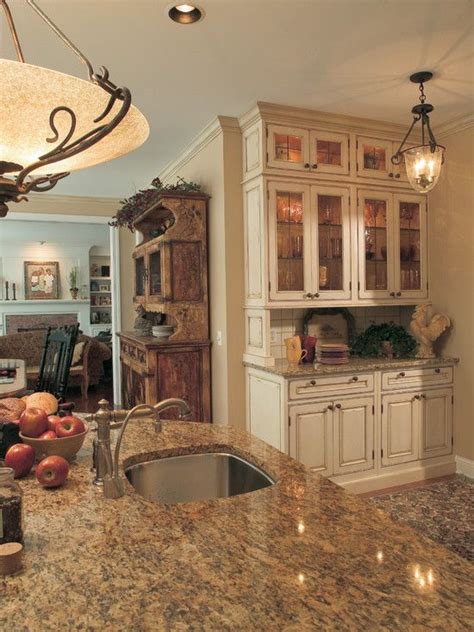 Stained wood cabinets have unique patterns and wood grains, so every kitchen will look a little different, even if the cabinet materials are the same. Now here's a thought... instead of trying to restore our ...