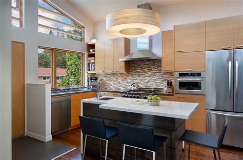 A modern kitchen has been remodeled to include silver cabinet, a metal silver chandelier with interlocking silver. 24 Tiny Island Ideas for the Smart Modern Kitchen