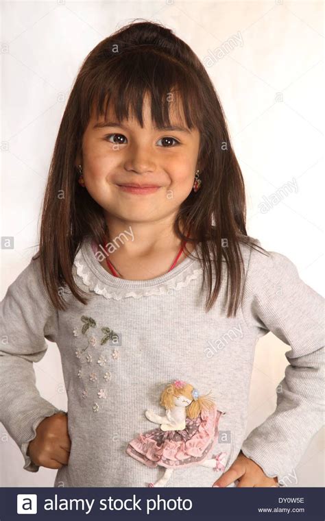 Download This Stock Image Pretty Little Girl Smiles Dy0w5e From
